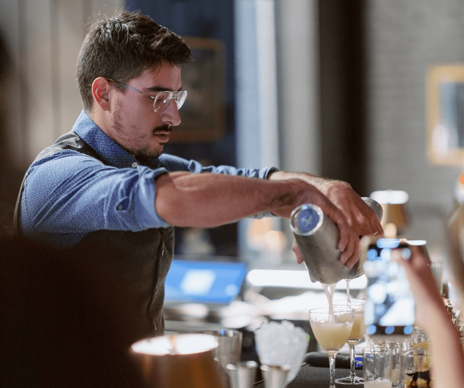 bartender pouring cocktails